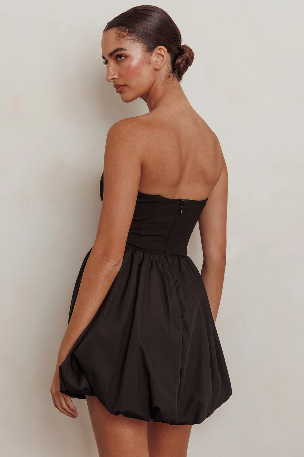 black mini bubble dress back view