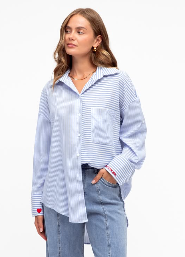 Stylish Oversized Blue Stripped Shirt for a versatile and timeless look. front view.