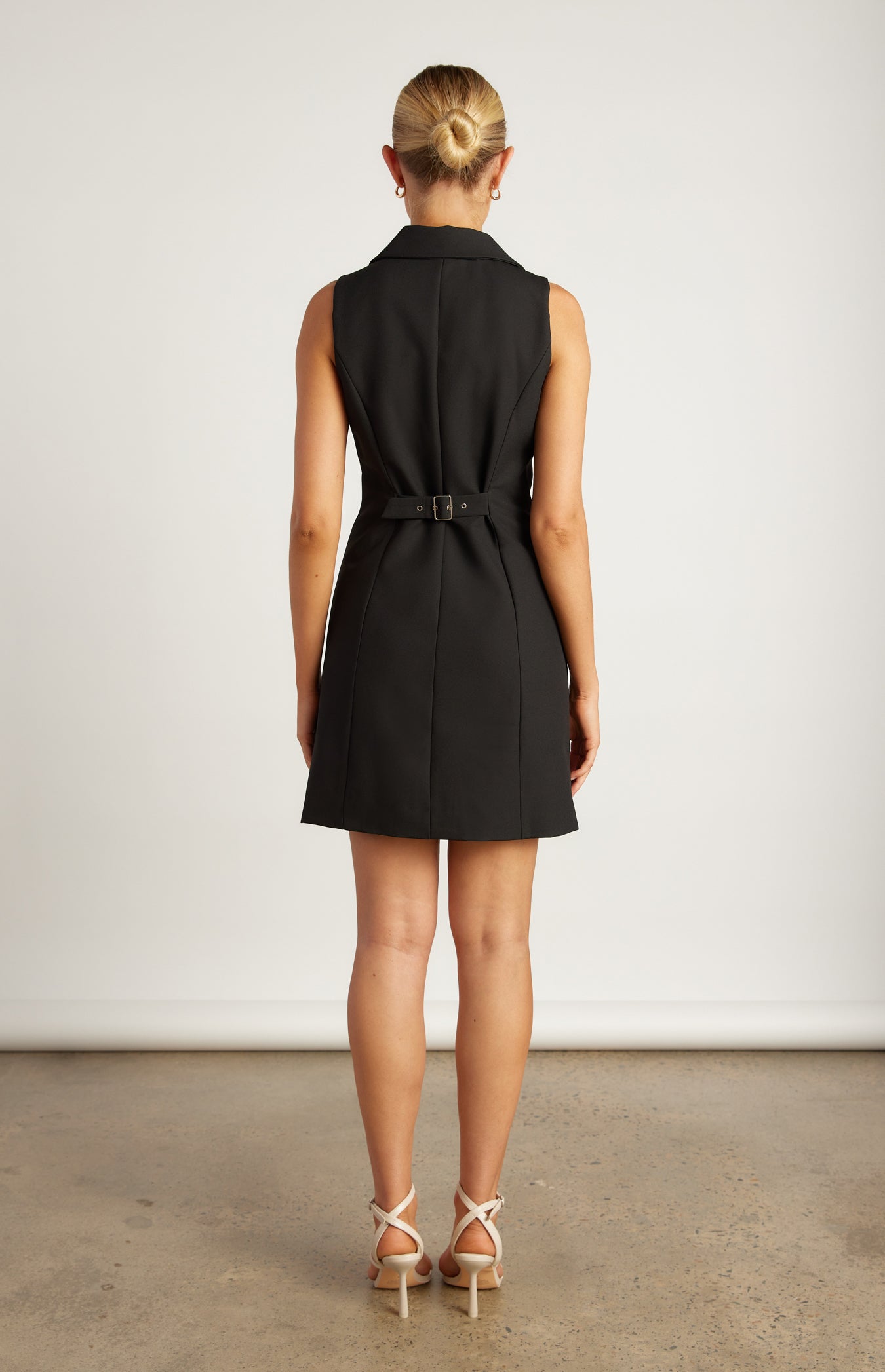 Blazer dress with front pocket detailing for a tailored and structured fit with 