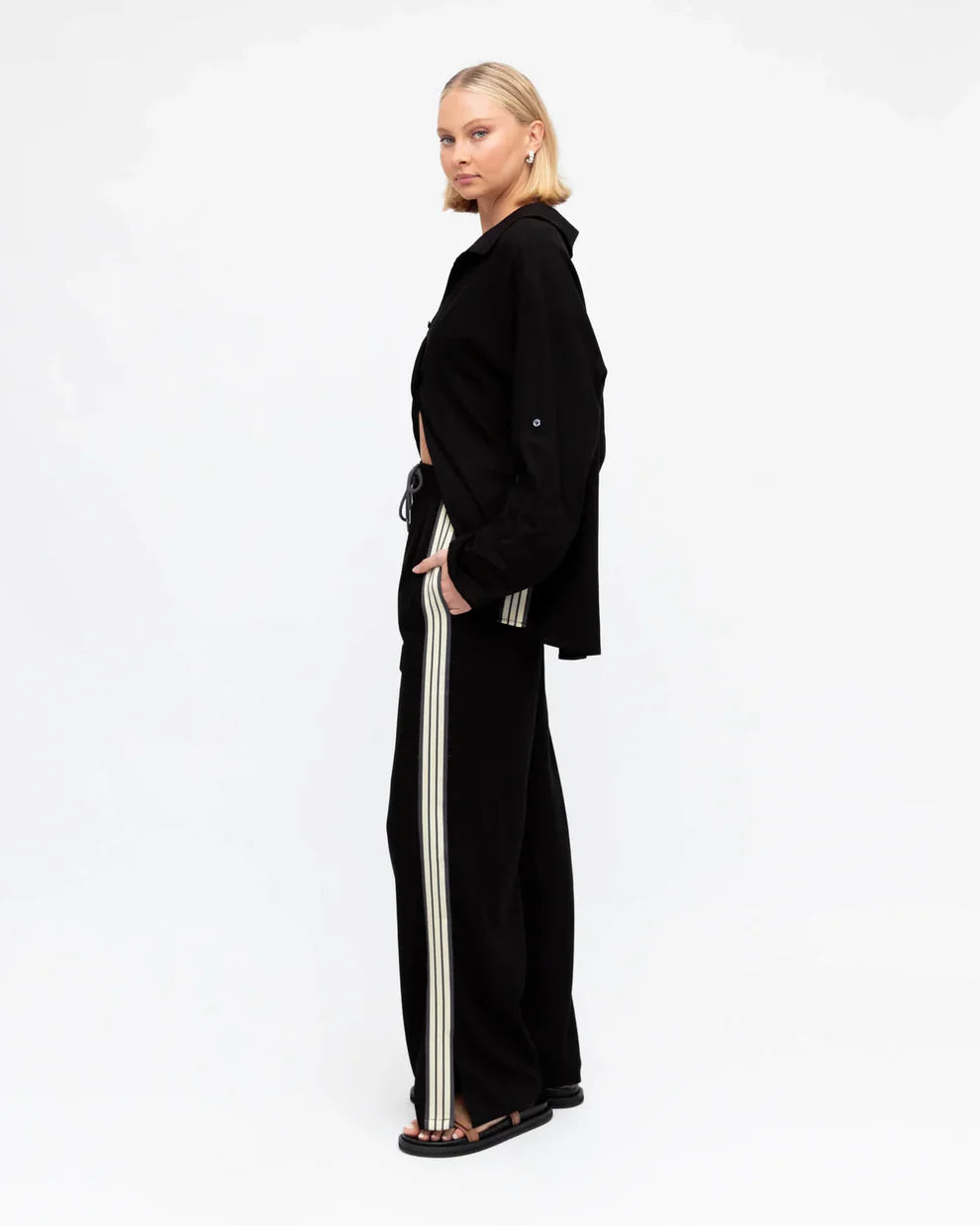 Tailored Lola pant with a sleek design, perfect for both professional and casual wear side view. 