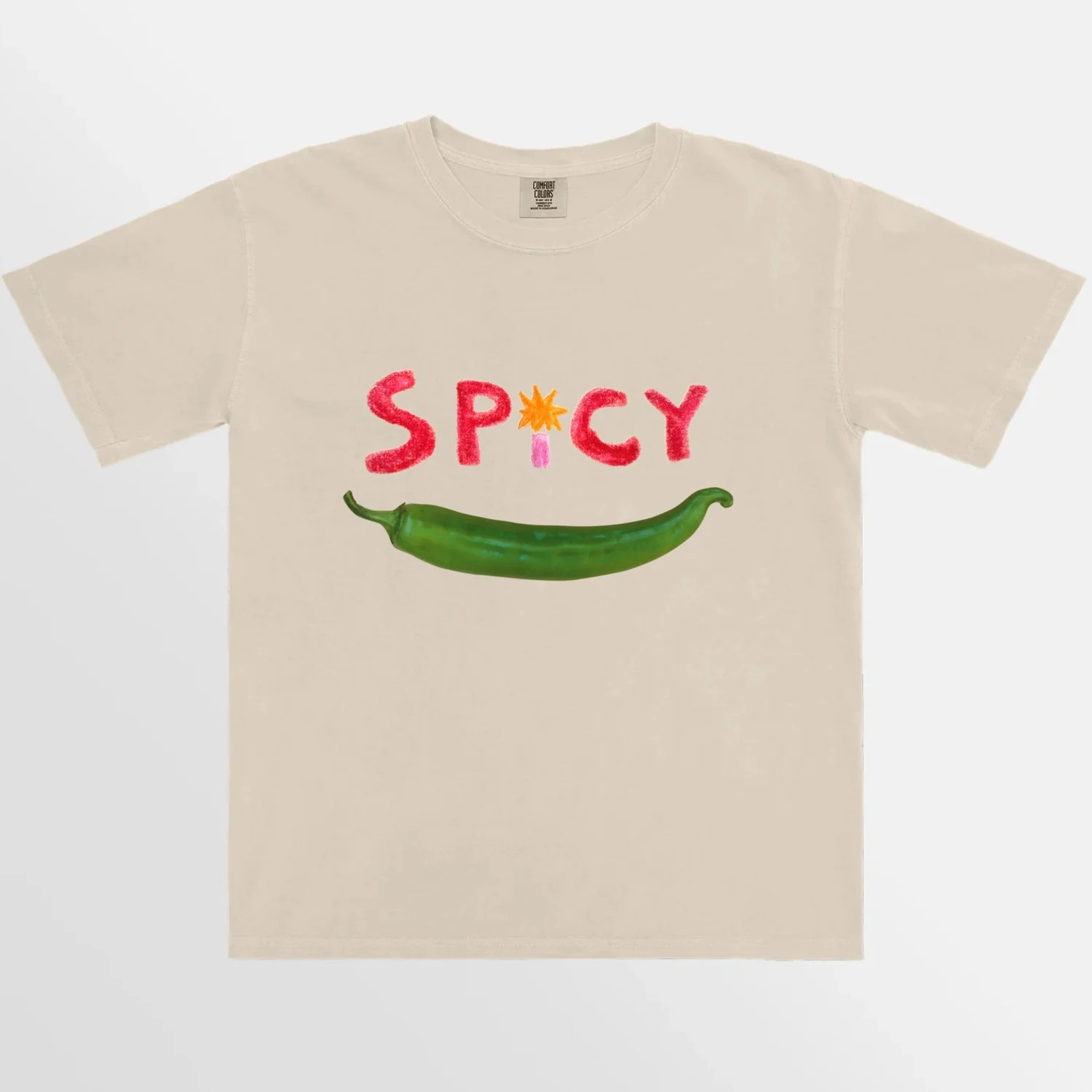 Front view of a soft cotton t-shirt in a light cream color, featuring a spicy  graphic design on the chest. The t-shirt has a crew neckline and short sleeves, perfect for casual wear or layering
