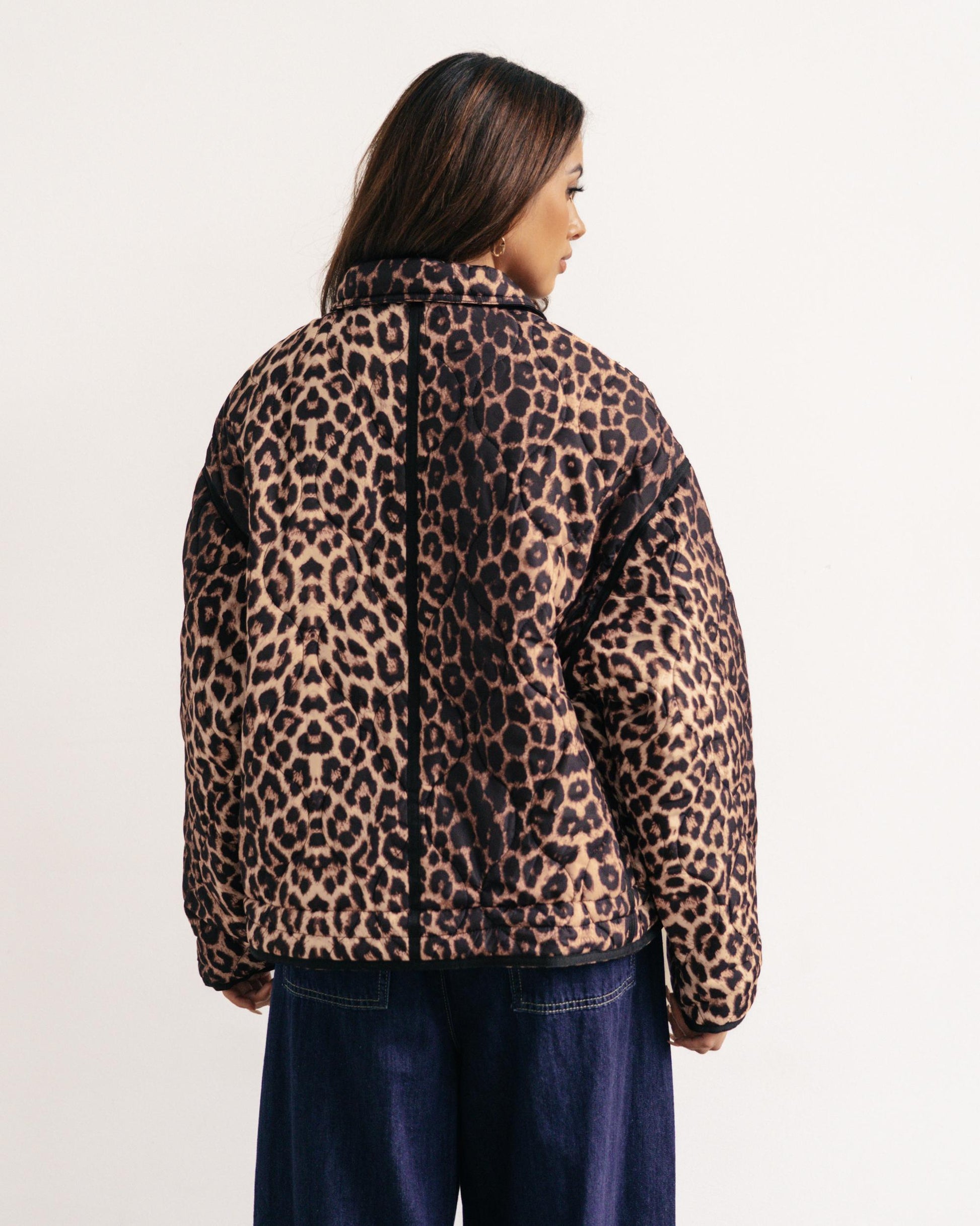 Trendy Leopard Print Puffer Jacket with black detailing. 