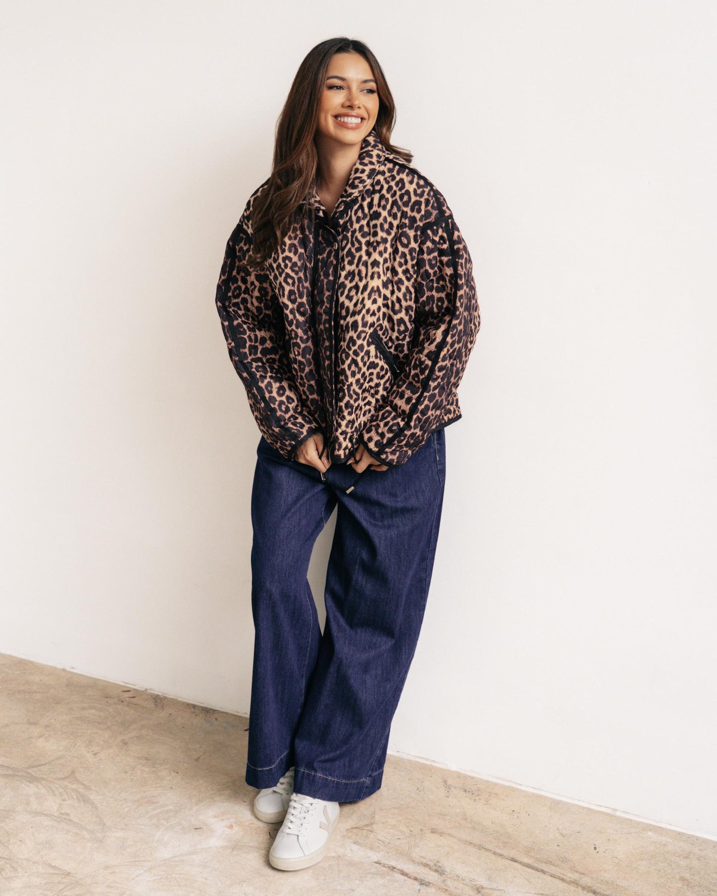 Trendy Leopard Print Puffer Jacket with black detailing. 