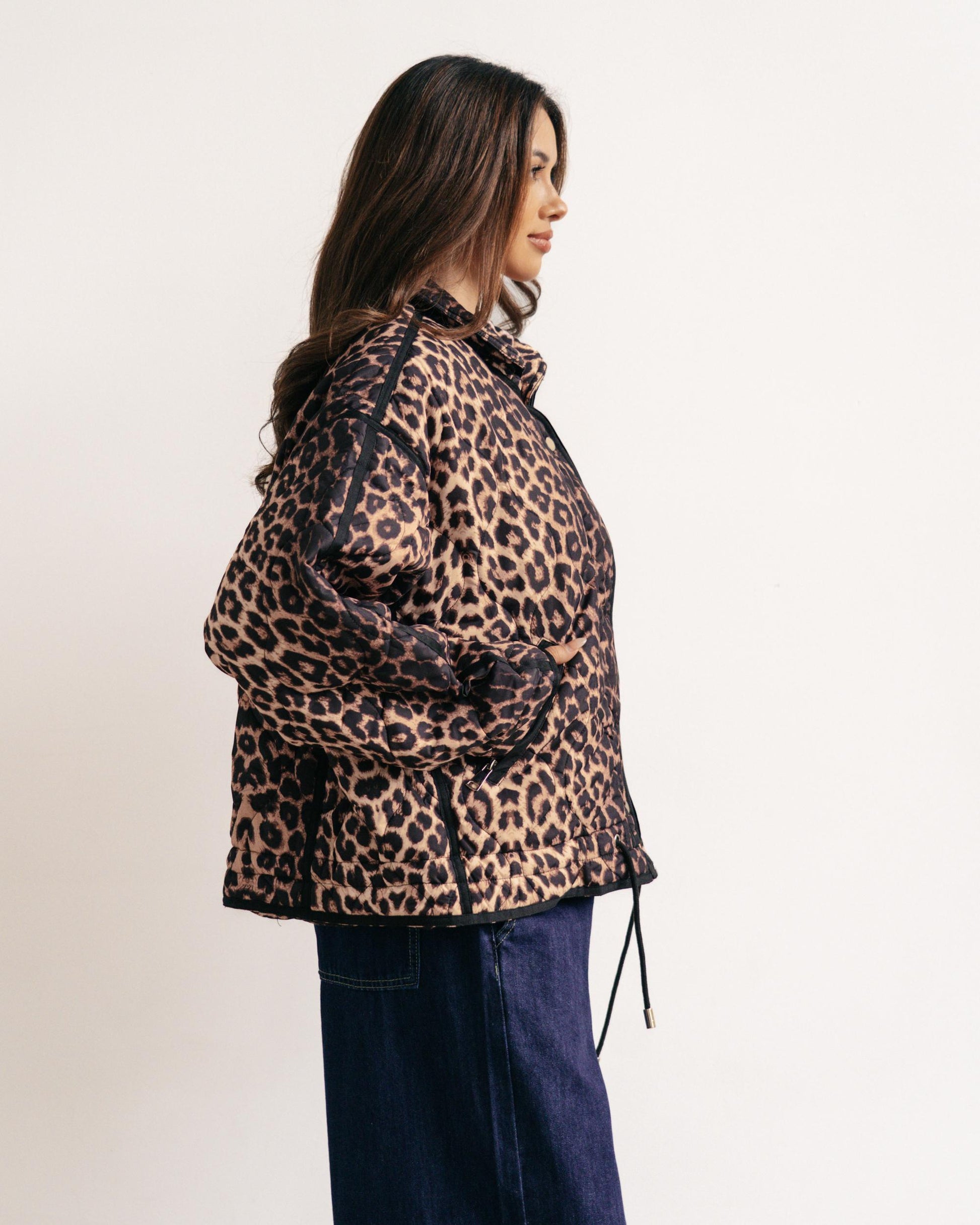Trendy Leopard Print Puffer Jacket with black detailing. 