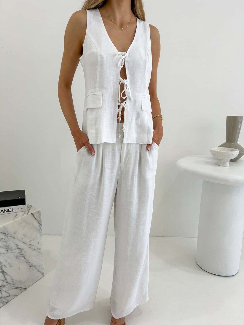 close up white tie vest linen blend